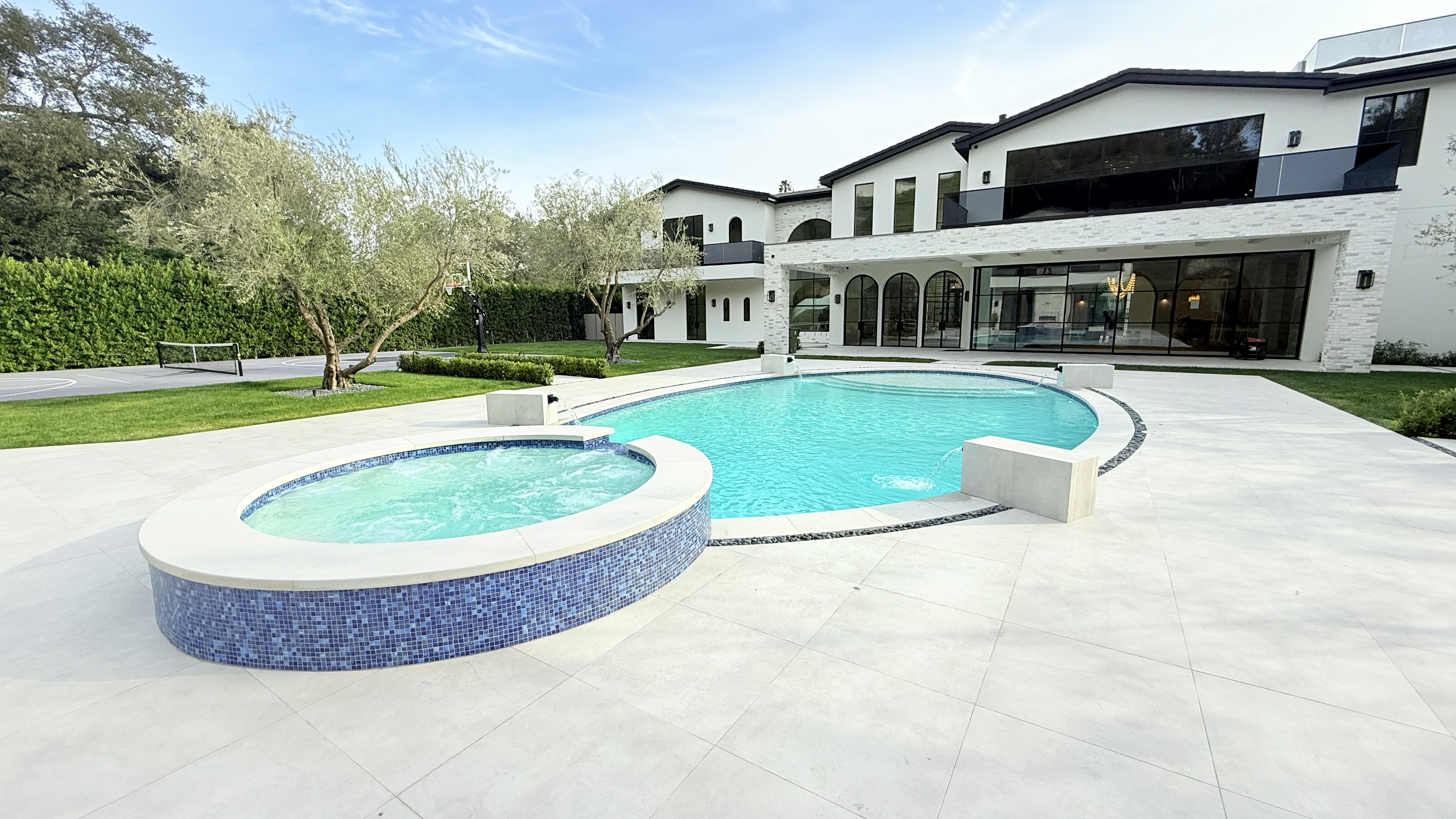 Resort-style pool with lounge area